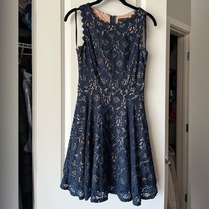 Navy embroidered dress. Beautiful dress for a cocktail party.